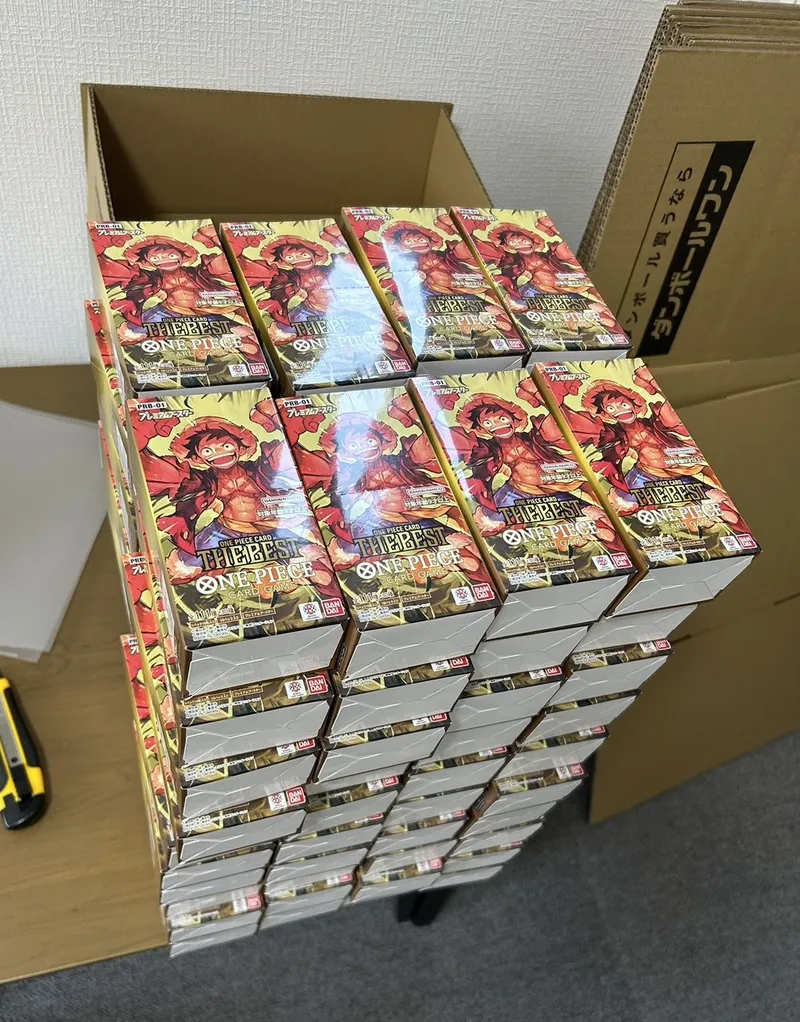 ONE PIECE boxes stacked for inspection